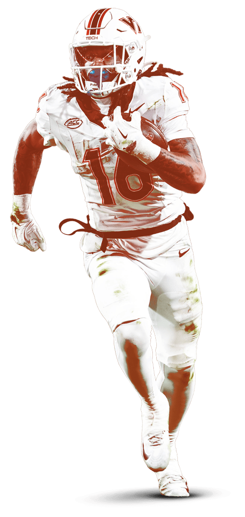 football player running football